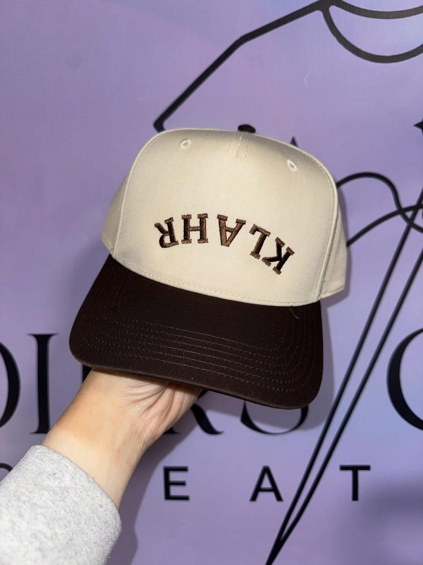 LAST NAME UPSIDE DOWN TRUCKER HAT